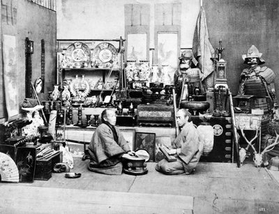 Japanese Shopkeepers with an Abacus by Japanese Photographer